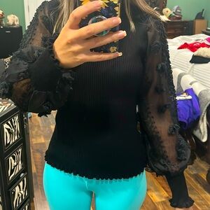 Black shirt with see thru sleeves